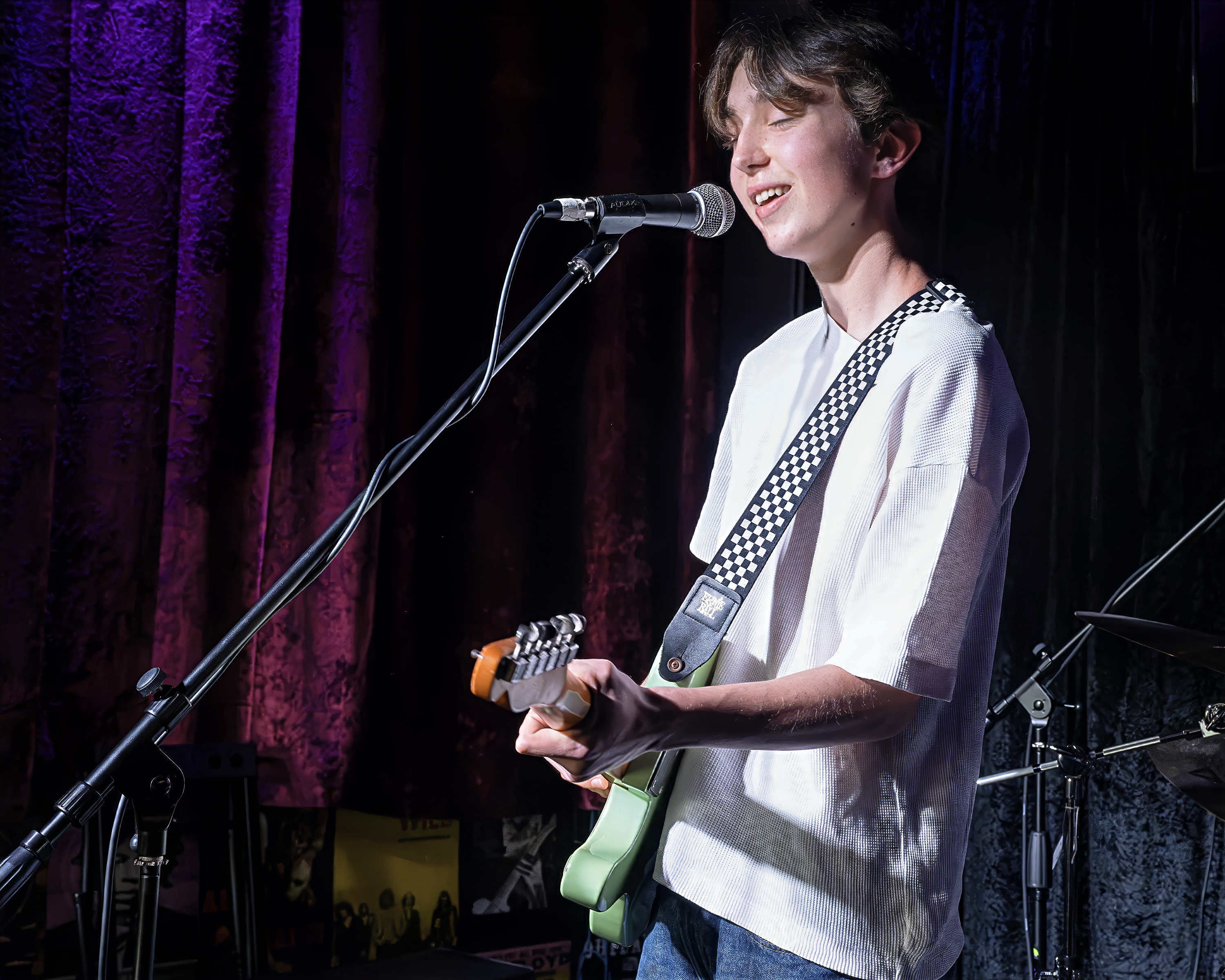 Seraph singing and playing guitar